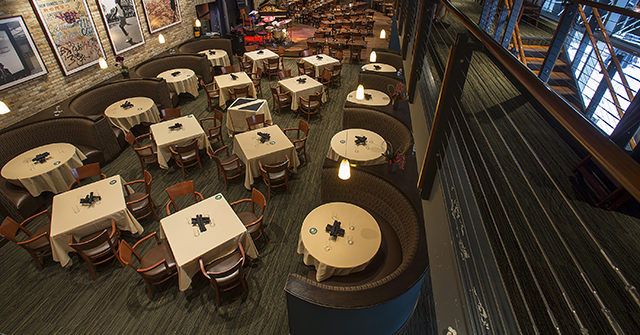 overhead view of empty tables in restaurant
